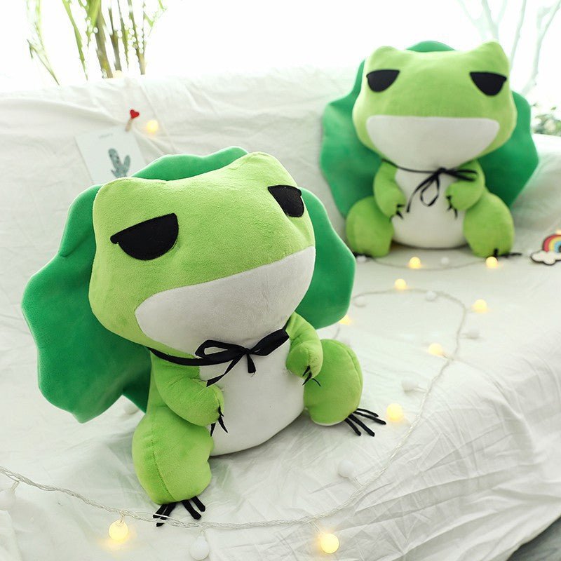 https://42shops.com/cdn/shop/products/frog-stuffed-animal-plush-toy-with-lotus-leaf-hat-223878.jpg?v=1672311417&width=1445