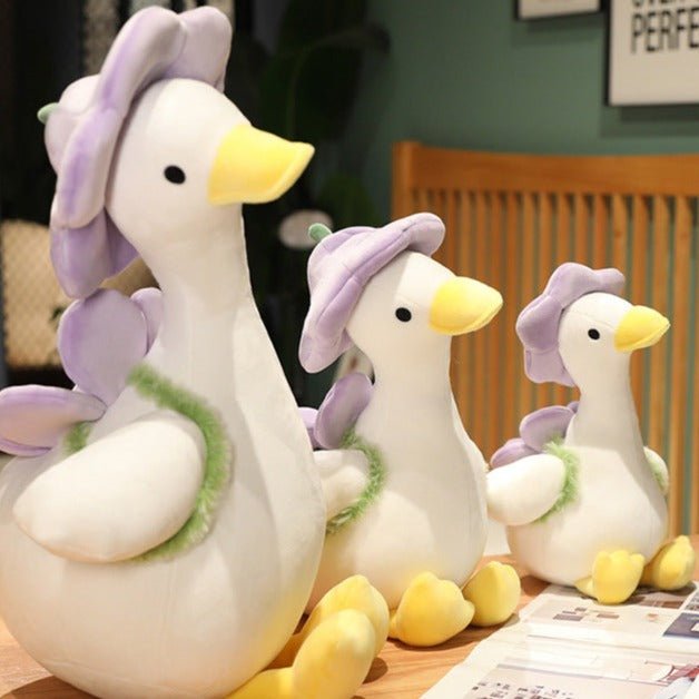 https://42shops.com/cdn/shop/products/white-duck-plush-toy-with-the-backpack-425765.jpg?v=1670103178&width=1445